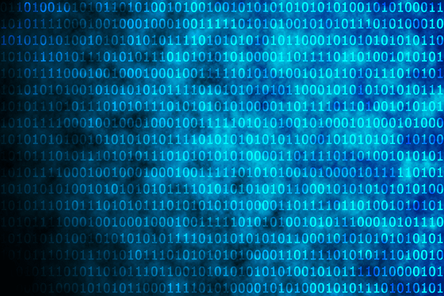 Koodikielen nollia ja ykkösiä riveissä sinimustalla pohjalla.
